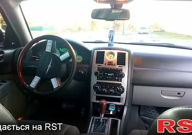Черный Крайслер 300C, объемом двигателя 35 л и пробегом 325 тыс. км за 9200 $, фото 1 на Automoto.ua