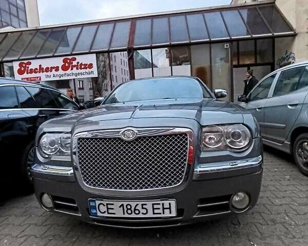 Серый Крайслер 300C, объемом двигателя 2.99 л и пробегом 210 тыс. км за 9000 $, фото 1 на Automoto.ua