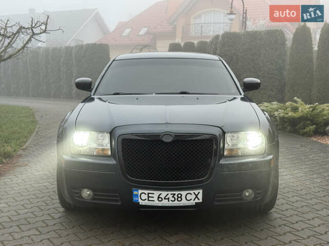 Синий Крайслер 300C, объемом двигателя 3.5 л и пробегом 150 тыс. км за 8700 $, фото 1 на Automoto.ua