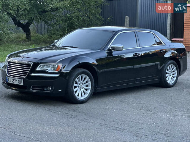 Чорний Крайслер 300, об'ємом двигуна 3.6 л та пробігом 215 тис. км за 9700 $, фото 1 на Automoto.ua
