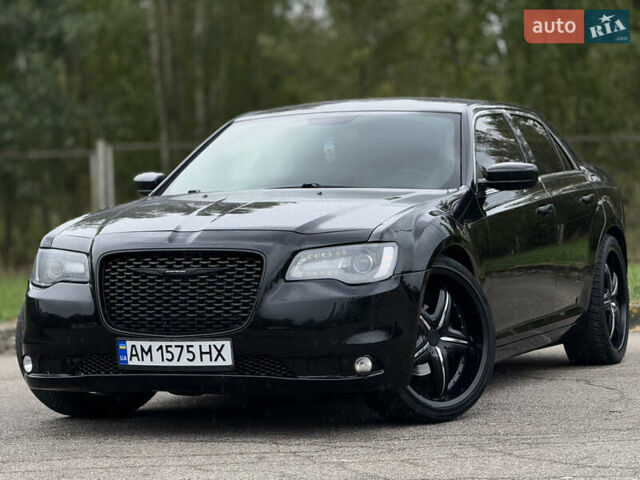 Чорний Крайслер 300, об'ємом двигуна 3.6 л та пробігом 282 тис. км за 10500 $, фото 1 на Automoto.ua