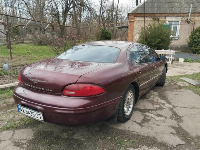 Красный Крайслер Конкорд, объемом двигателя 3.2 л и пробегом 367 тыс. км за 1952 $, фото 1 на Automoto.ua