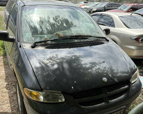 Черный Крайслер Гранд Вояджер, объемом двигателя 2.5 л и пробегом 392 тыс. км за 3100 $, фото 1 на Automoto.ua