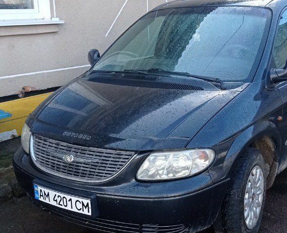 Чорний Крайслер Grand Voyager, об'ємом двигуна 2.5 л та пробігом 250 тис. км за 5300 $, фото 1 на Automoto.ua