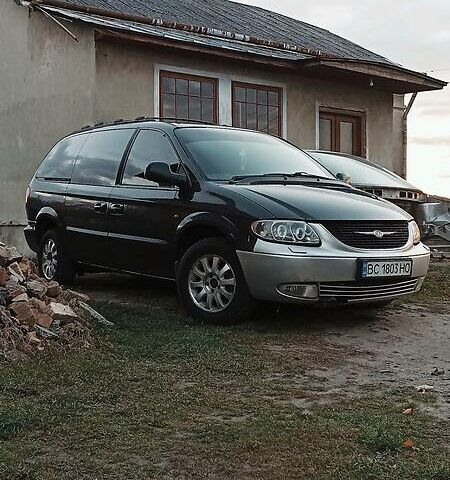 Чорний Крайслер Grand Voyager, об'ємом двигуна 2.5 л та пробігом 250 тис. км за 6500 $, фото 1 на Automoto.ua