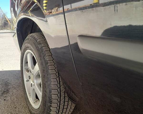 Чорний Крайслер Grand Voyager, об'ємом двигуна 2.78 л та пробігом 257 тис. км за 6300 $, фото 1 на Automoto.ua