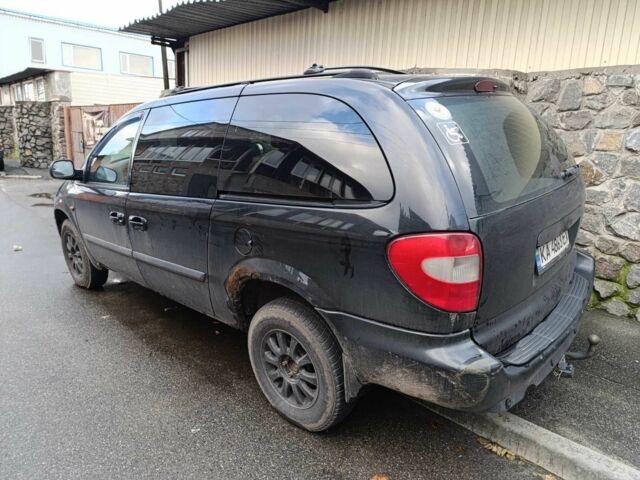 Черный Крайслер Гранд Вояджер, объемом двигателя 2.8 л и пробегом 365 тыс. км за 4200 $, фото 1 на Automoto.ua