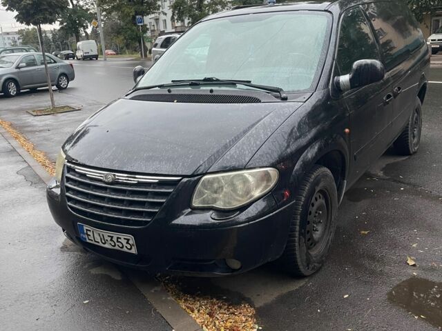 Черный Крайслер Гранд Вояджер, объемом двигателя 0 л и пробегом 200 тыс. км за 3093 $, фото 1 на Automoto.ua