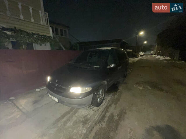 Черный Крайслер Гранд Вояджер, объемом двигателя 2.5 л и пробегом 285 тыс. км за 5100 $, фото 1 на Automoto.ua