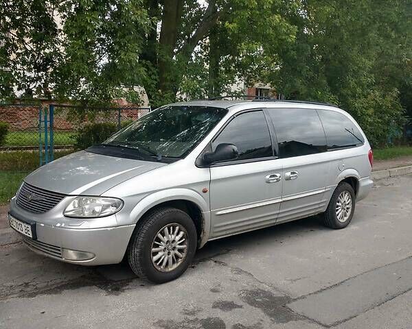 Сірий Крайслер Grand Voyager, об'ємом двигуна 2.5 л та пробігом 217 тис. км за 5180 $, фото 1 на Automoto.ua