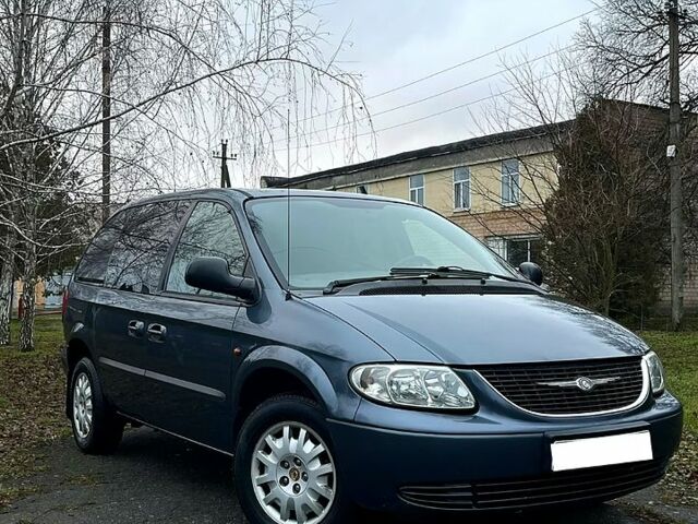 Синий Крайслер Гранд Вояджер, объемом двигателя 2.5 л и пробегом 300 тыс. км за 3700 $, фото 1 на Automoto.ua