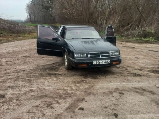 Черный Крайслер ЛЕ Барон, объемом двигателя 2.2 л и пробегом 100 тыс. км за 1066 $, фото 1 на Automoto.ua