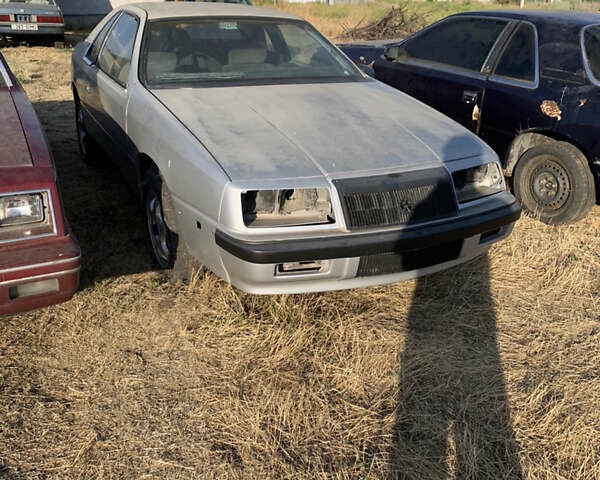 Серый Крайслер ЛЕ Барон, объемом двигателя 2.2 л и пробегом 200 тыс. км за 800 $, фото 1 на Automoto.ua