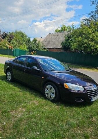 Красный Крайслер Себринг, объемом двигателя 2 л и пробегом 177 тыс. км за 3800 $, фото 1 на Automoto.ua