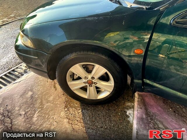 Зеленый Крайслер Статус, объемом двигателя 2.5 л и пробегом 320 тыс. км за 2500 $, фото 1 на Automoto.ua