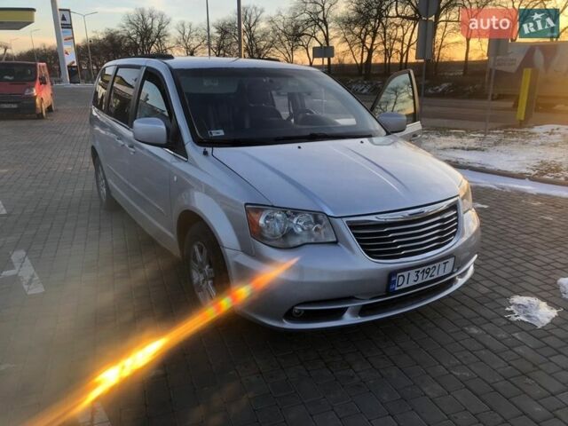 Сірий Крайслер Town & Country, об'ємом двигуна 3.6 л та пробігом 170 тис. км за 9500 $, фото 1 на Automoto.ua