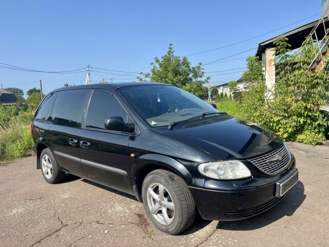 Черный Крайслер Вояджер, объемом двигателя 2.5 л и пробегом 400 тыс. км за 4550 $, фото 1 на Automoto.ua