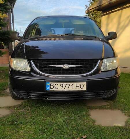 Черный Крайслер Вояджер, объемом двигателя 2.5 л и пробегом 342 тыс. км за 4500 $, фото 1 на Automoto.ua