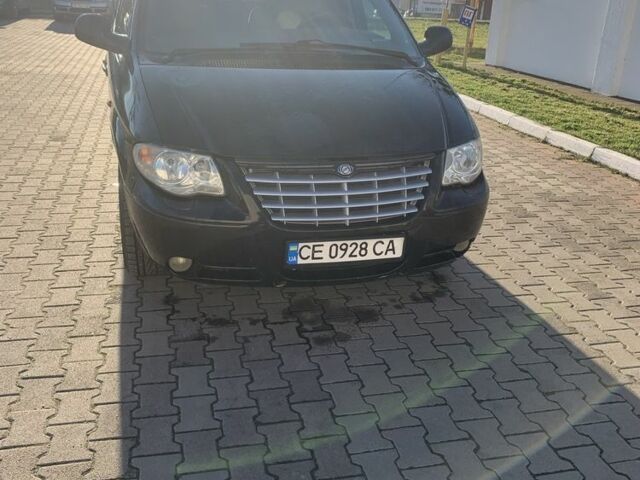 Черный Крайслер Вояджер, объемом двигателя 2.5 л и пробегом 340 тыс. км за 2999 $, фото 1 на Automoto.ua