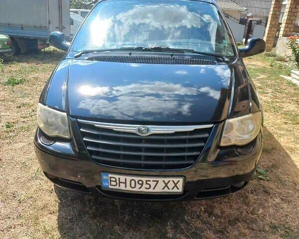 Чорний Крайслер Voyager, об'ємом двигуна 2.5 л та пробігом 290 тис. км за 6000 $, фото 1 на Automoto.ua