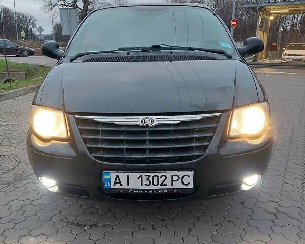 Чорний Крайслер Voyager, об'ємом двигуна 2.8 л та пробігом 225 тис. км за 5000 $, фото 1 на Automoto.ua