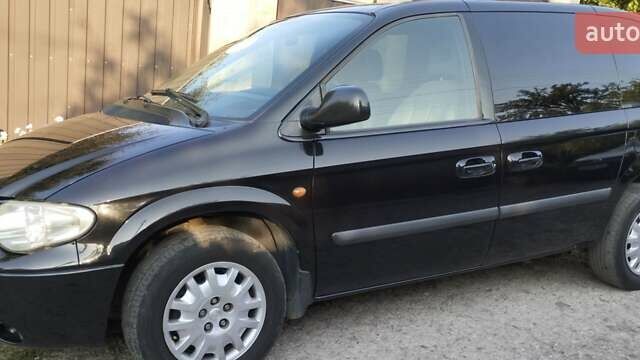 Черный Крайслер Вояджер, объемом двигателя 2.78 л и пробегом 195 тыс. км за 6500 $, фото 1 на Automoto.ua