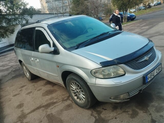 Серый Крайслер Вояджер, объемом двигателя 2.5 л и пробегом 250 тыс. км за 1656 $, фото 1 на Automoto.ua