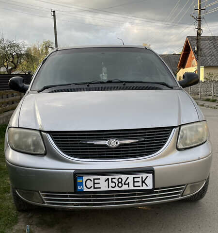 Сірий Крайслер Voyager, об'ємом двигуна 2.5 л та пробігом 319 тис. км за 5500 $, фото 1 на Automoto.ua