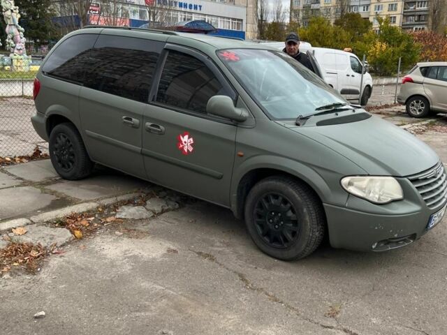Зеленый Крайслер Вояджер, объемом двигателя 0 л и пробегом 2 тыс. км за 4095 $, фото 1 на Automoto.ua