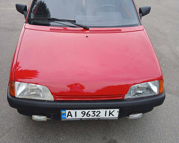 Красный Ситроен АХ, объемом двигателя 1.1 л и пробегом 240 тыс. км за 900 $, фото 1 на Automoto.ua
