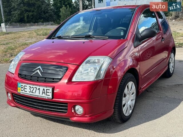 Червоний Сітроен С2, об'ємом двигуна 1.36 л та пробігом 154 тис. км за 4200 $, фото 1 на Automoto.ua