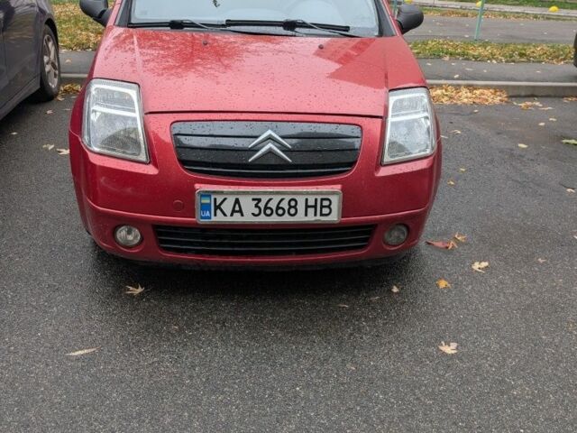 Красный Ситроен С2, объемом двигателя 1.4 л и пробегом 194 тыс. км за 3900 $, фото 1 на Automoto.ua