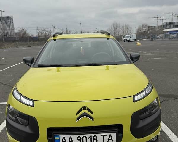 Жовтий Сітроен C4 Кактус, об'ємом двигуна 1.2 л та пробігом 88 тис. км за 10000 $, фото 1 на Automoto.ua