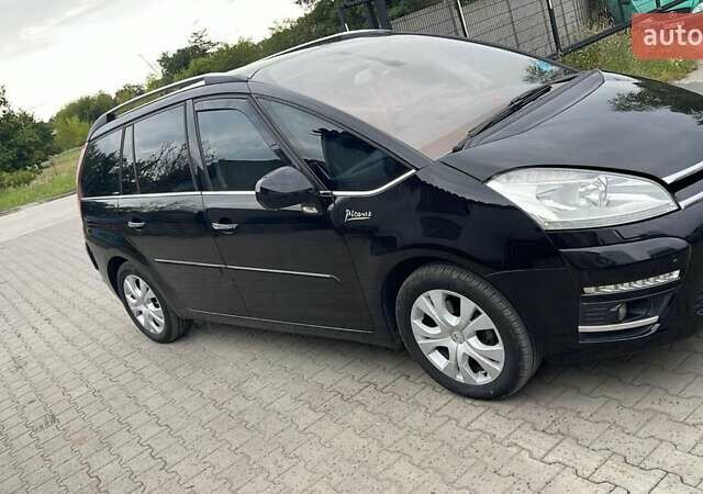Черный Ситроен С4 Пикассо, объемом двигателя 2 л и пробегом 218 тыс. км за 7700 $, фото 1 на Automoto.ua