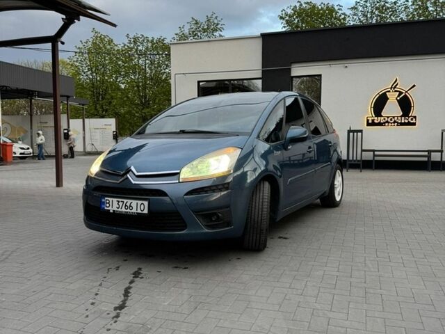 Синий Ситроен С4 Пикассо, объемом двигателя 1.56 л и пробегом 263 тыс. км за 5990 $, фото 1 на Automoto.ua