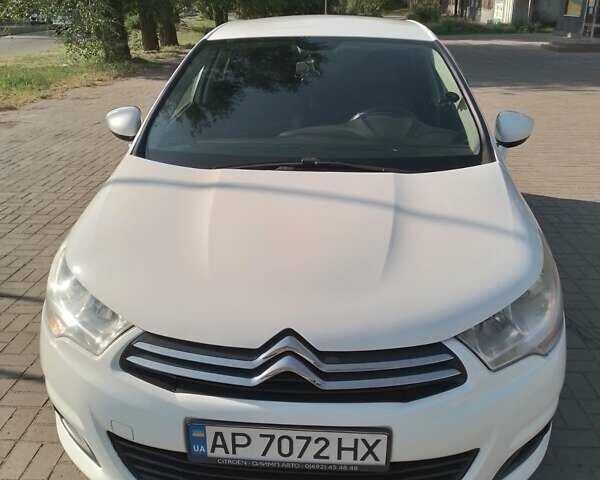 Білий Сітроен С4, об'ємом двигуна 1.59 л та пробігом 264 тис. км за 6800 $, фото 1 на Automoto.ua