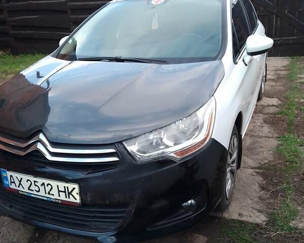 Белый Ситроен С4, объемом двигателя 1.59 л и пробегом 235 тыс. км за 4500 $, фото 1 на Automoto.ua