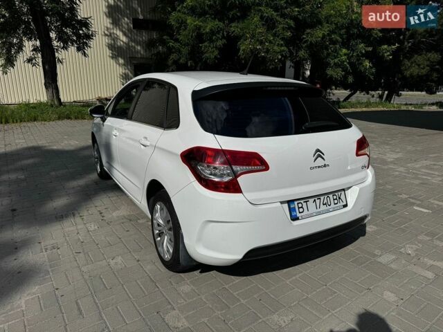Белый Ситроен С4, объемом двигателя 1.56 л и пробегом 105 тыс. км за 7500 $, фото 1 на Automoto.ua