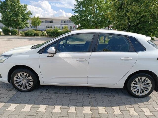 Белый Ситроен С4, объемом двигателя 1.6 л и пробегом 98 тыс. км за 10490 $, фото 1 на Automoto.ua