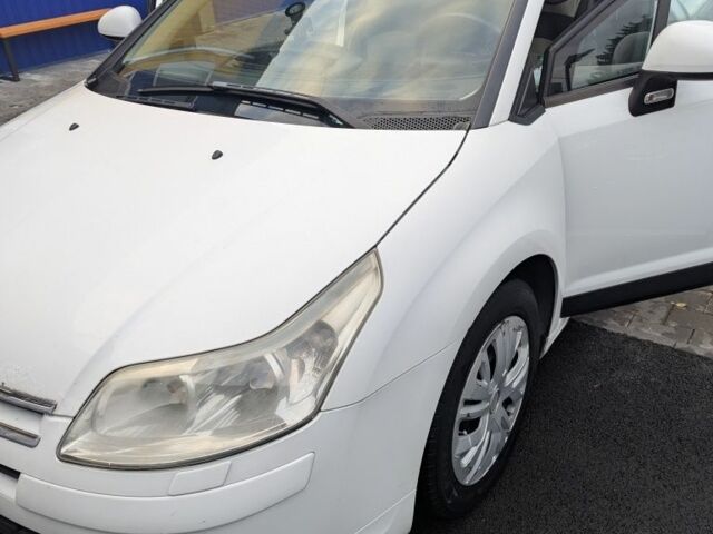 Белый Ситроен С4, объемом двигателя 1.6 л и пробегом 316 тыс. км за 3499 $, фото 1 на Automoto.ua