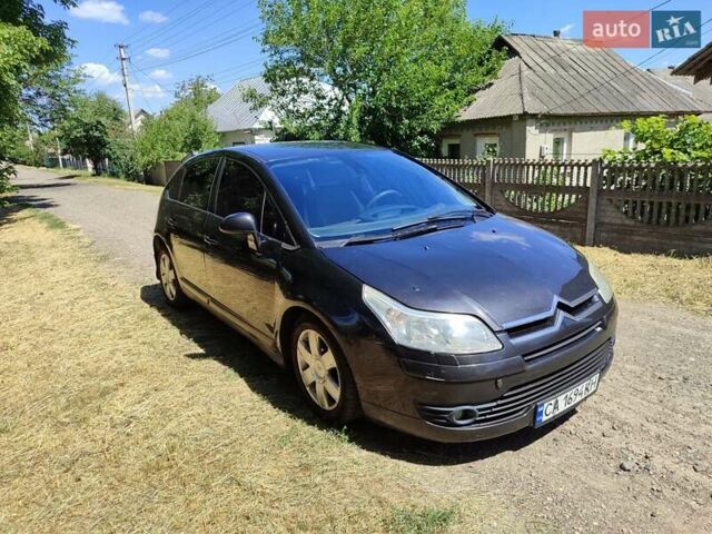 Чорний Сітроен С4, об'ємом двигуна 2 л та пробігом 393 тис. км за 4400 $, фото 1 на Automoto.ua