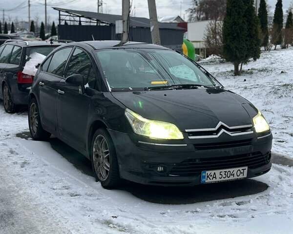 Черный Ситроен С4, объемом двигателя 2 л и пробегом 244 тыс. км за 4500 $, фото 1 на Automoto.ua