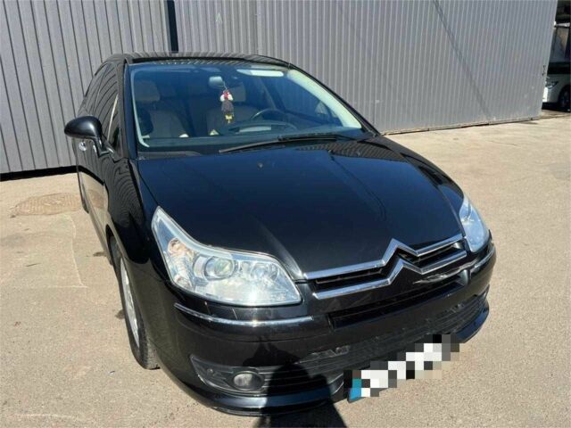 Черный Ситроен С4, объемом двигателя 2 л и пробегом 252 тыс. км за 6000 $, фото 1 на Automoto.ua