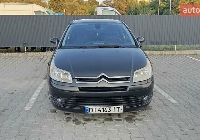 Черный Ситроен С4, объемом двигателя 2 л и пробегом 180 тыс. км за 4600 $, фото 1 на Automoto.ua
