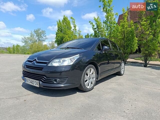 Черный Ситроен С4, объемом двигателя 1.6 л и пробегом 328 тыс. км за 4500 $, фото 1 на Automoto.ua