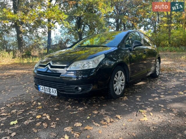 Черный Ситроен С4, объемом двигателя 1.59 л и пробегом 260 тыс. км за 5300 $, фото 1 на Automoto.ua