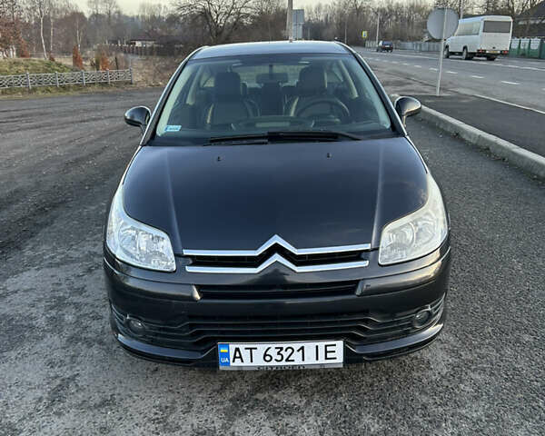 Черный Ситроен С4, объемом двигателя 1.4 л и пробегом 230 тыс. км за 3750 $, фото 1 на Automoto.ua