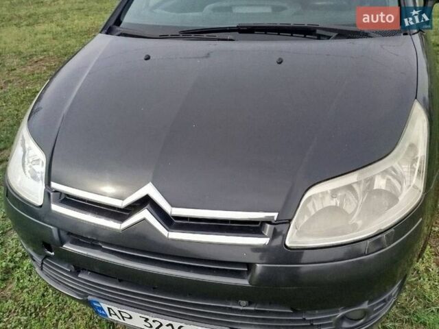 Черный Ситроен С4, объемом двигателя 1.6 л и пробегом 290 тыс. км за 5000 $, фото 1 на Automoto.ua