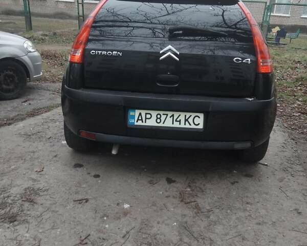 Черный Ситроен С4, объемом двигателя 1.6 л и пробегом 205 тыс. км за 4000 $, фото 1 на Automoto.ua
