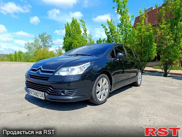Черный Ситроен С4, объемом двигателя 1.6 л и пробегом 328 тыс. км за 4500 $, фото 1 на Automoto.ua